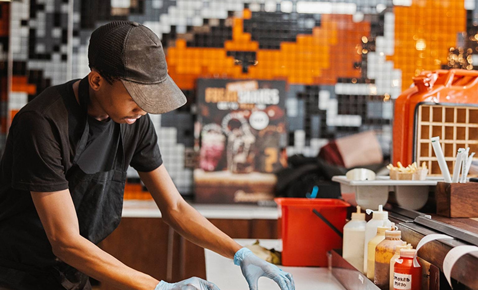 Apprentice working at fast food restaurant